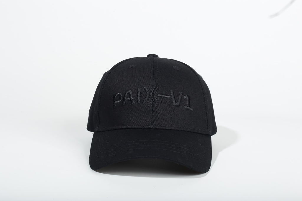 PAIX-V1 cap in all black with black embroidered logo, front view