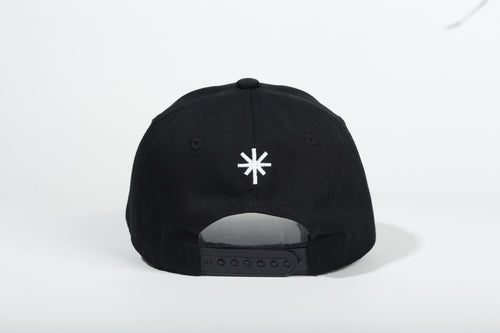 PAIX-V1 cap back view with white embroidered symbol and adjustable snap closure
