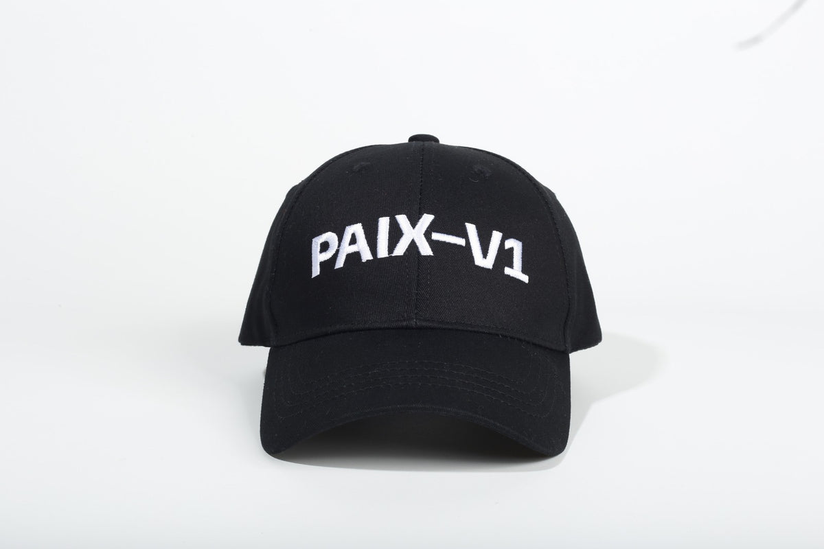 PAIX-V1 cap in black with white embroidered logo, front view